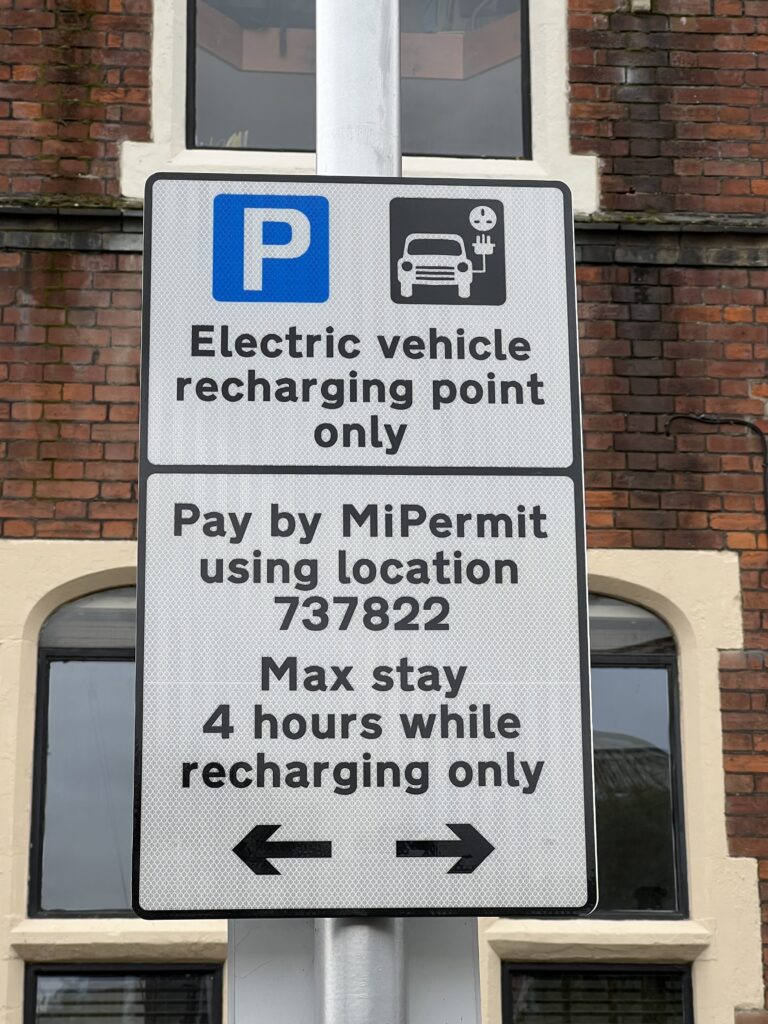 Photograph of Electrical Vehicle Charging signage in car park