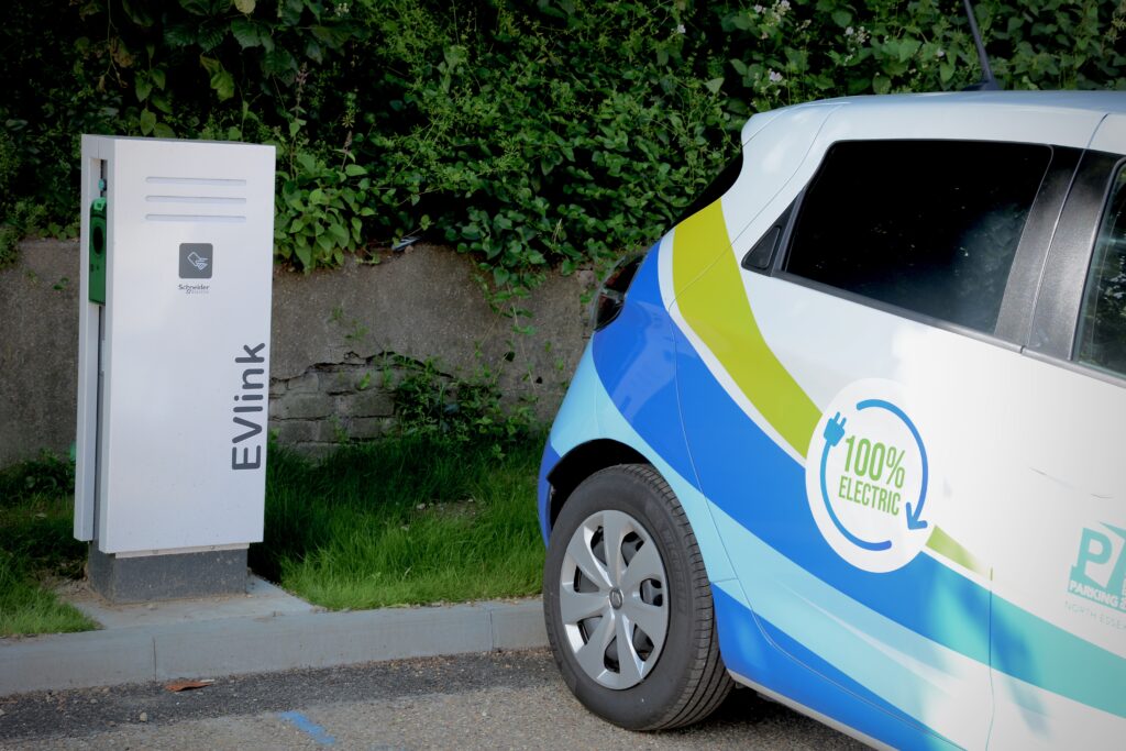 Photo of a NEPP EV vehicle and charging point