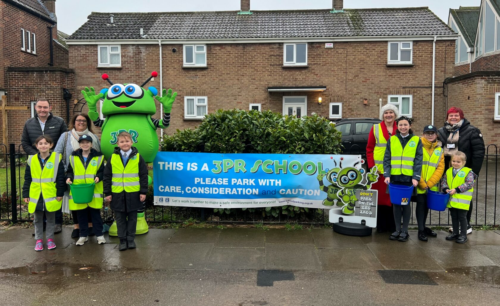 Photo of 3PR launch at St Teresa’s Catholic Primary School in Colchester on 10 January 2023: (Not in order) Councillor Martin Goss (NEPP’s Member for Colchester City Council), Ward Councillors Sue Lissimore and Leigh Tate, Mrs Kelly (Headteacher of St Teresa’s Catholic Primary School), school pupils and the 3PR costumed-character.